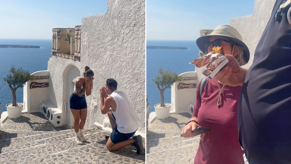 Turistas comiendo una chocolatina arruinan el vídeo de compromiso de una pareja